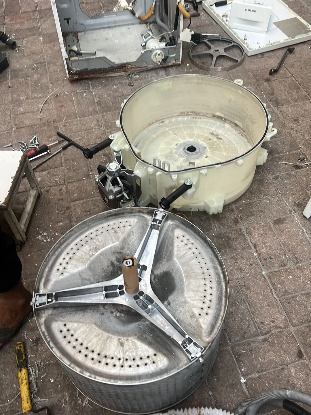 Washing machine drum opened for repair in Business Bay